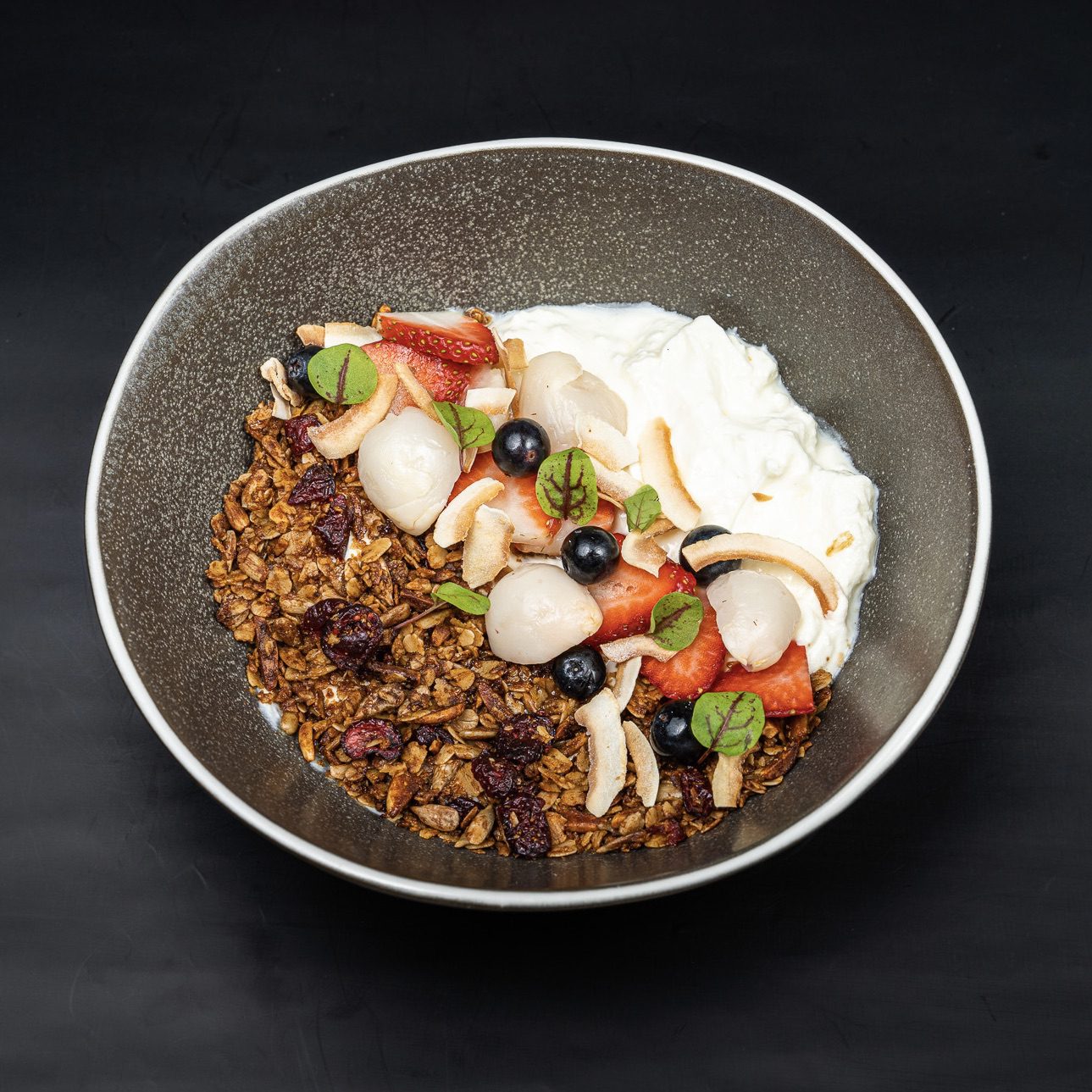 granola and fruit breakfast an example of food photography