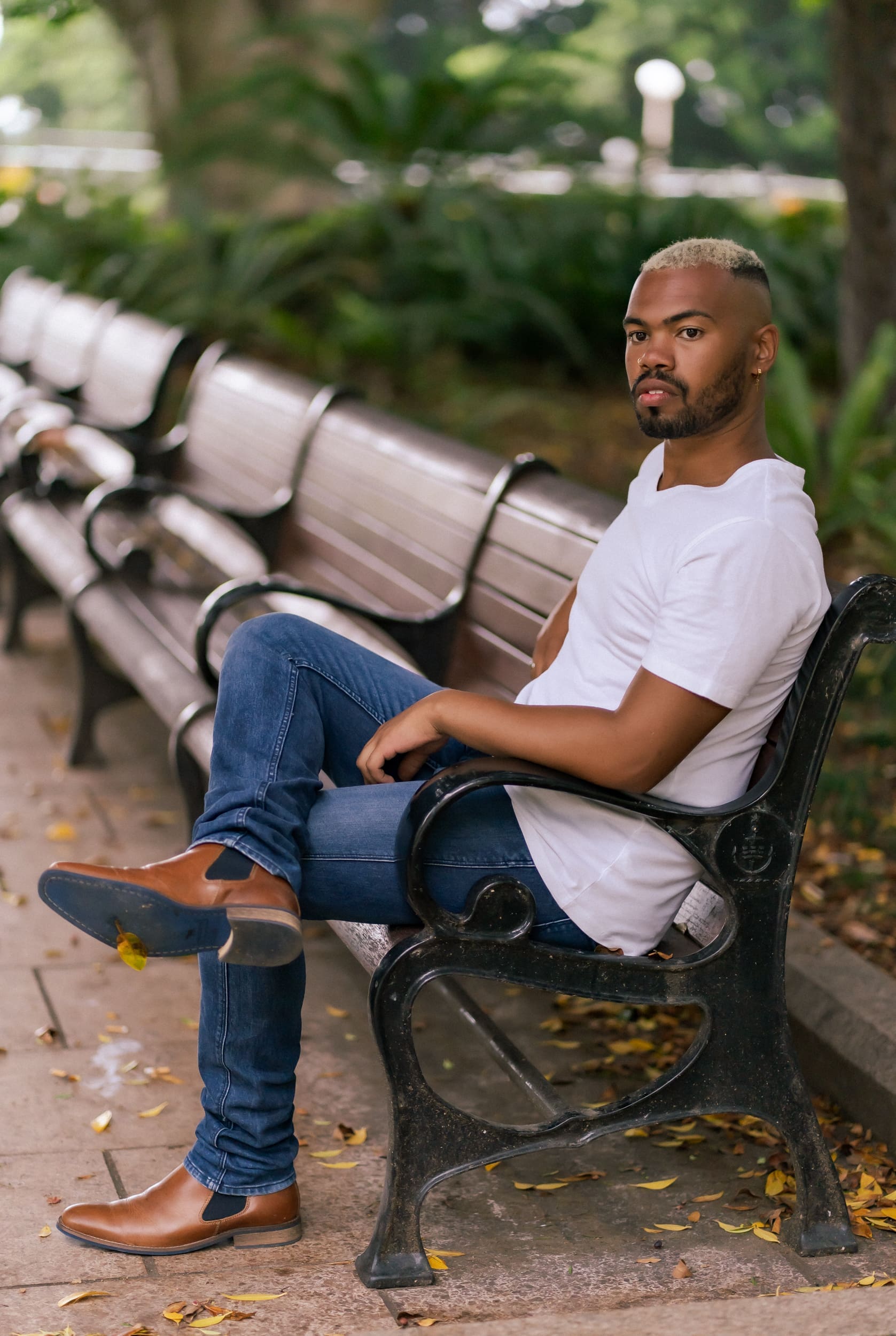 Ext: Young black man in a white t-shirt having a casual dating photo taken by dating photographer Georgie Greene in Sydney NSW