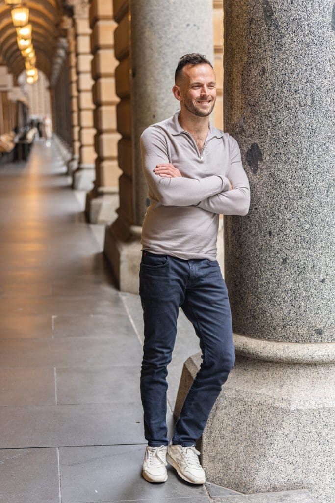 Ext: Young man wearing a brown shirt having a dating profile photo taken by dating app photographer Georgie Greene in Sydney NSW