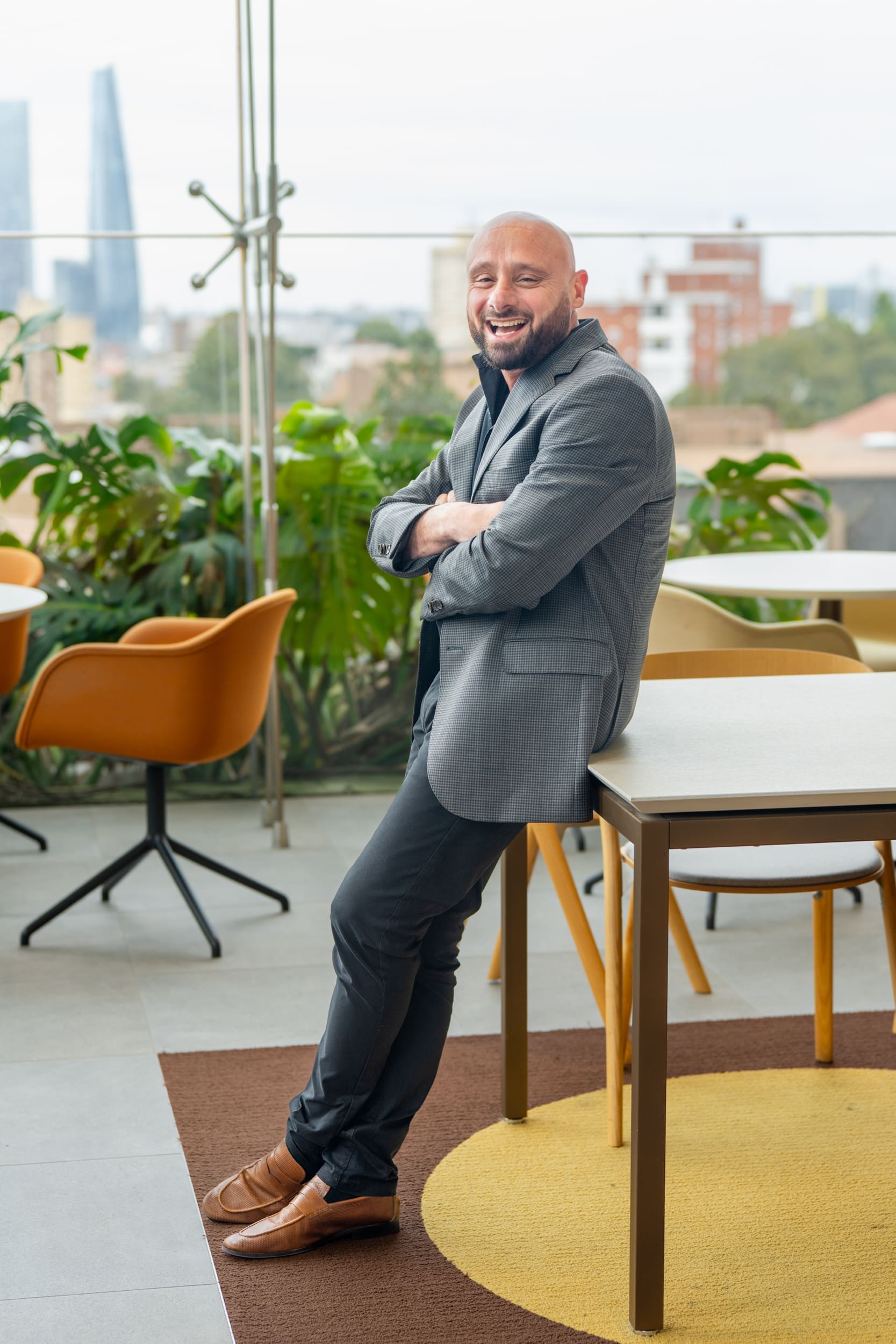 Int: Entrepreneur wearing a grey jacket having his branding photos taken by portrait photographer Georgie Greene in Sydney NSW