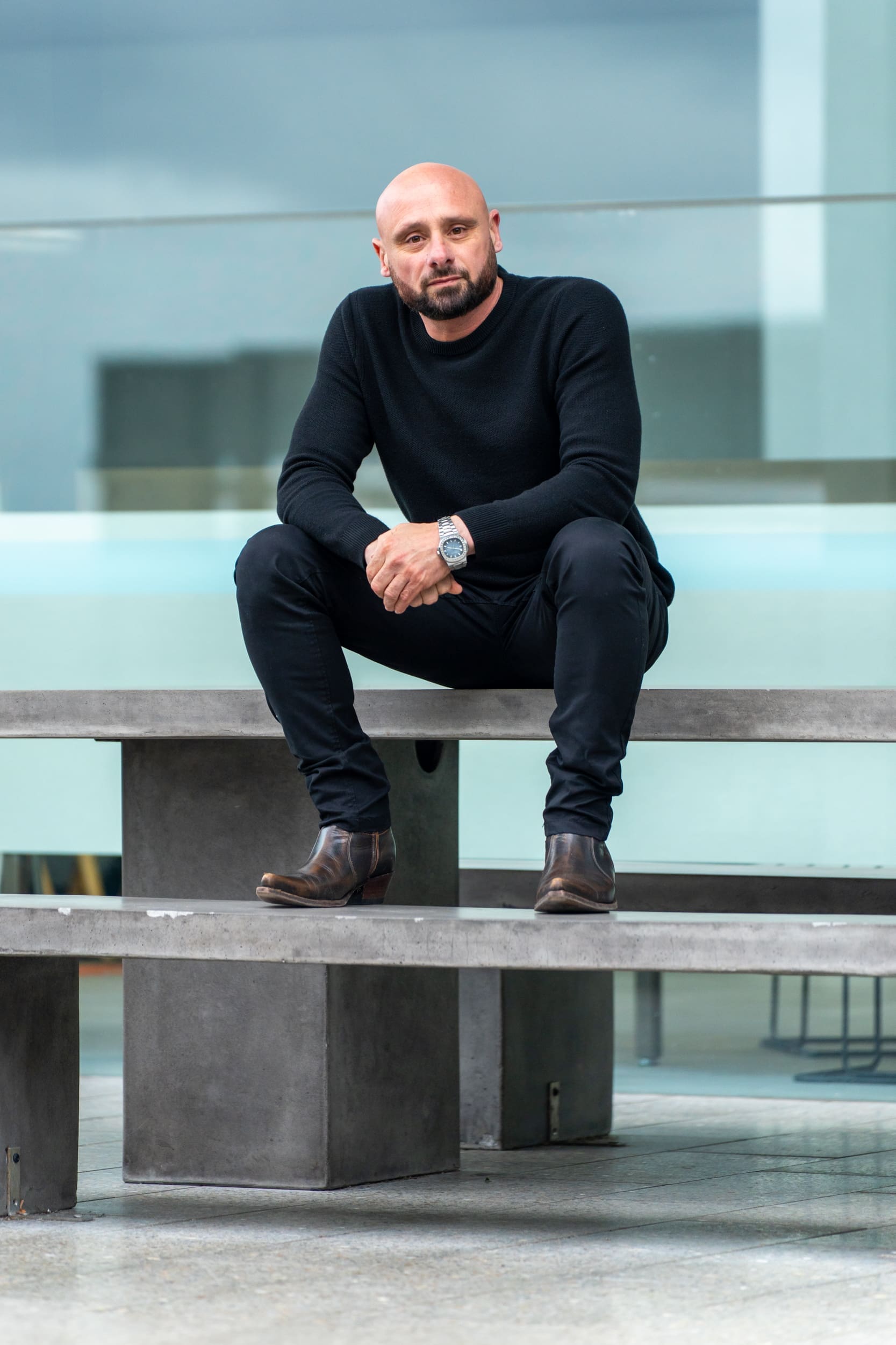 Ext: Entrepreneur wearing black having his personal photoshoot with Branding photographer Georgie Greene in Sydney NSW