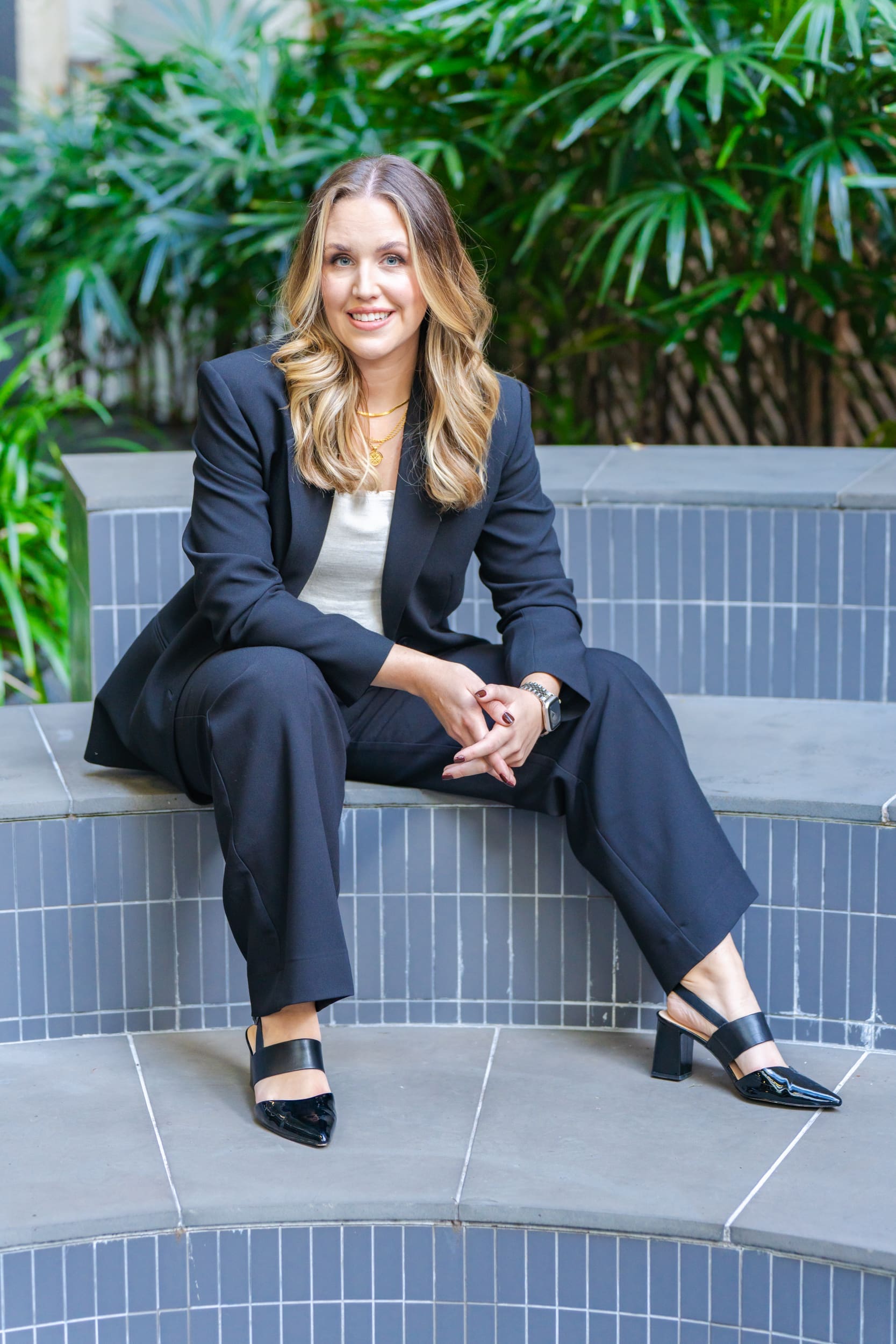 Ext: Managing director wearing a blue suite having portrait shots taken by personal branding photographer Georgie Greene in Sydney NSW