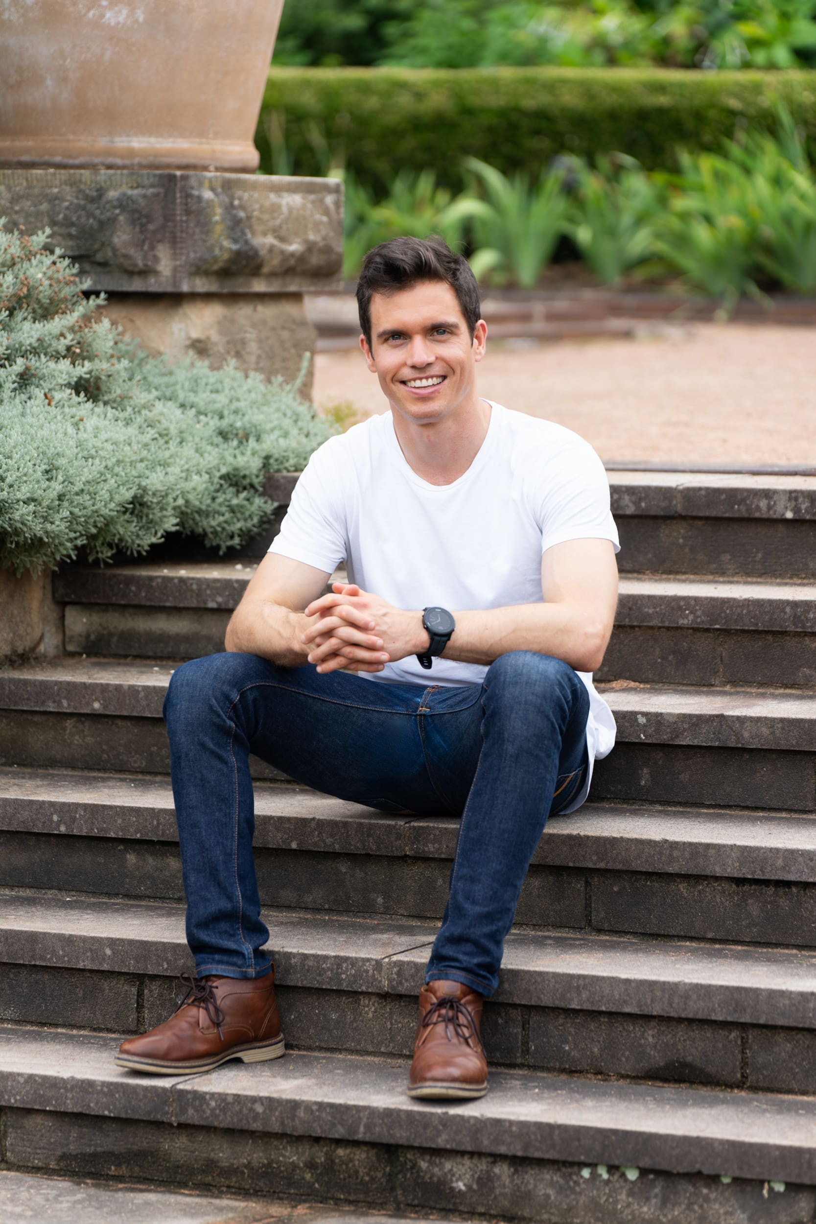 Ext: Young man wearing a white t-shirt having photography for dating taken by professional photographer Georgie Greene in Sydney NSW