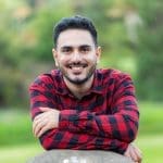 Young man with dark hair and beard having his dating photos taken by dating photographer Georgie Greene