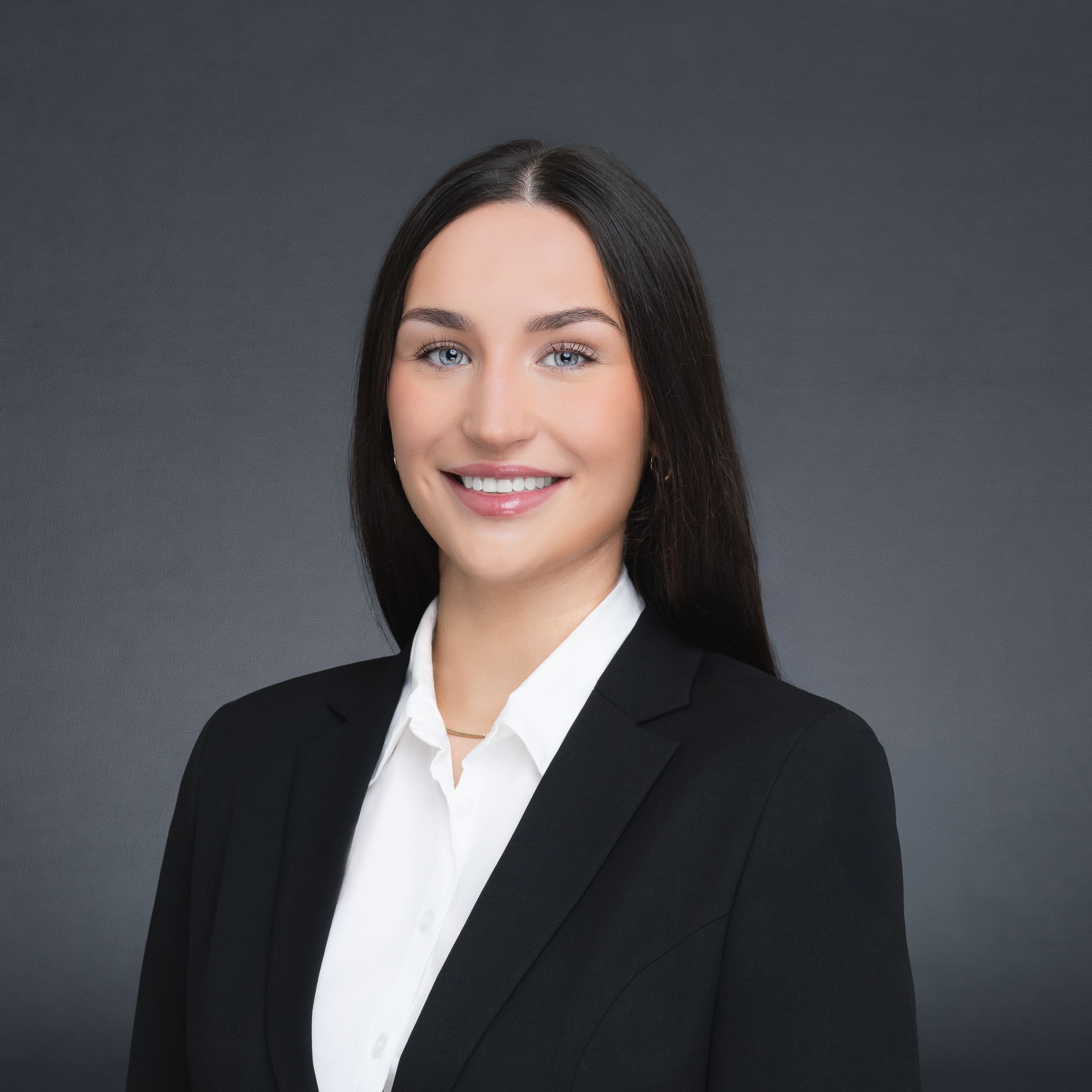 Female Lawyer wearing black and having her corporate headshot taken by Sydney professional photographer Georgie Greene