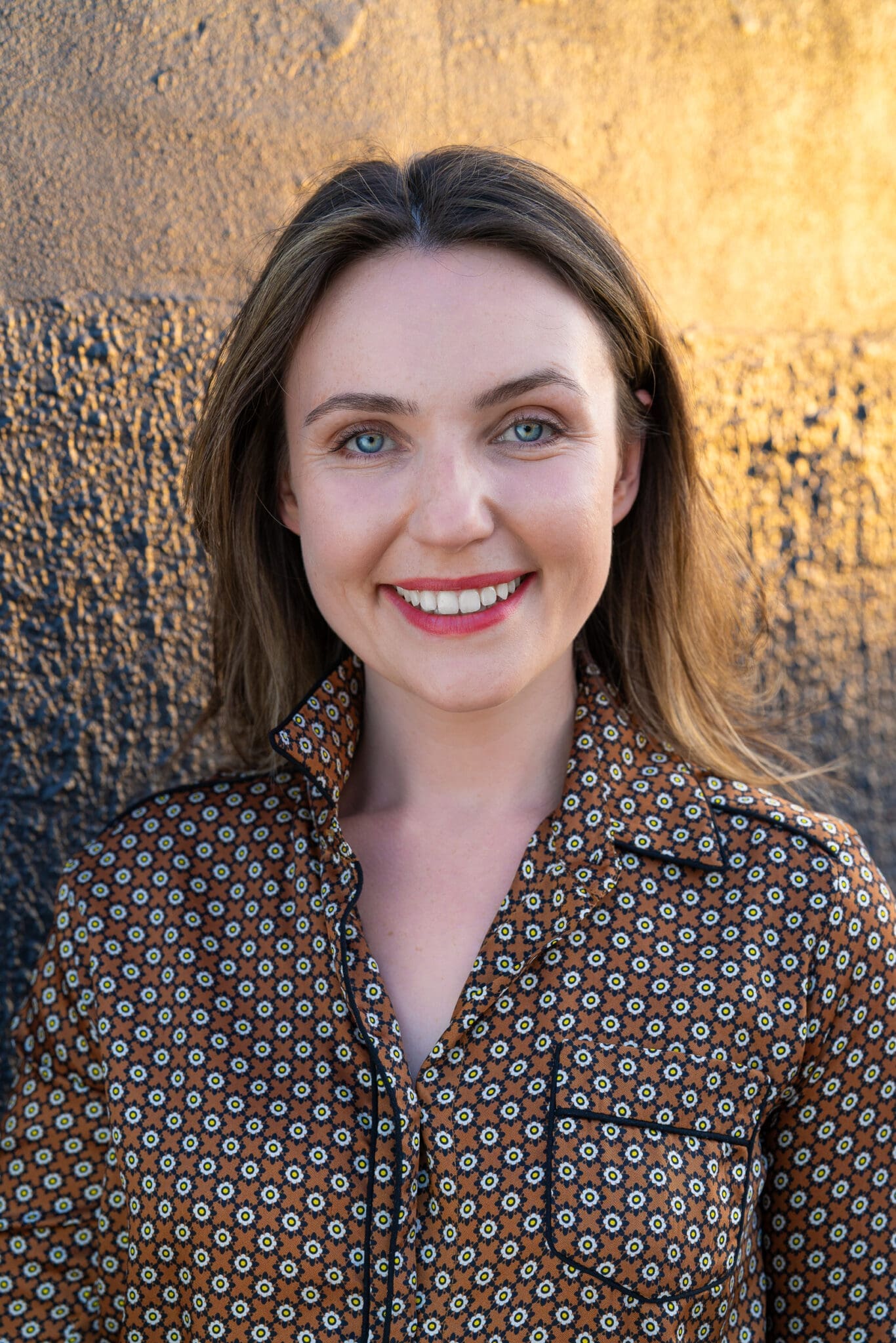 Young woman in a brown top having your LinkedIn headshot taken by professional photographer Georgie Greene Sydney NSW