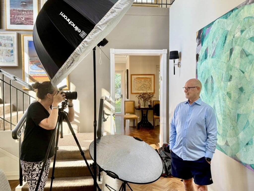 Georgie Greene Sydney headshot photographer taking a headshot in a Sydney home