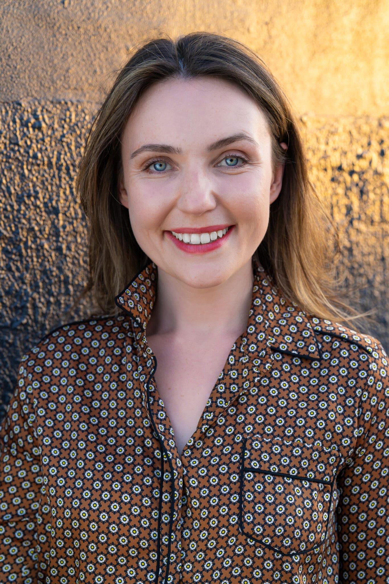 Young woman in a brown top having your LinkedIn headshot taken by professional photographer Georgie Greene Sydney NSW