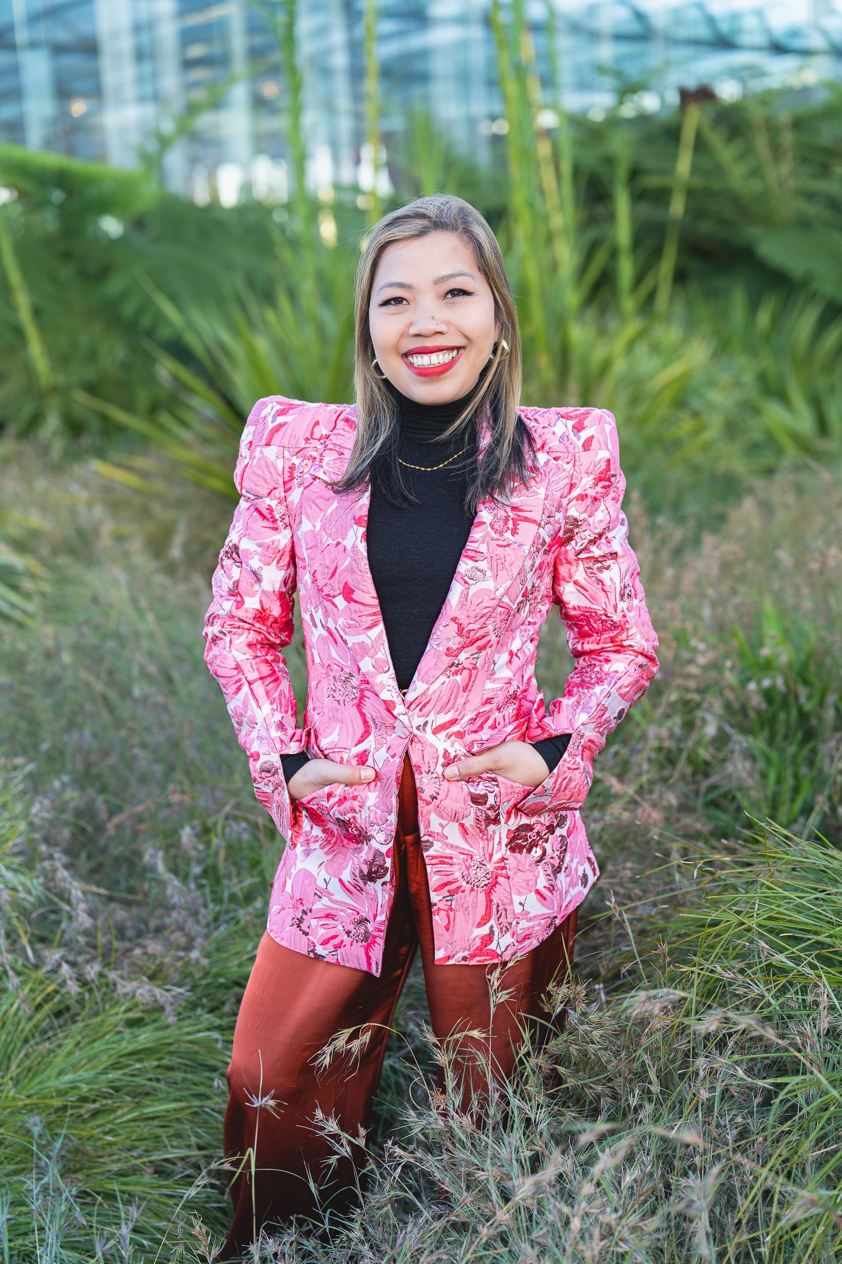 Indonesian business woman wearing a pink jacket having her personal branding photos taken by Sydney professional photographer Georgie Greene