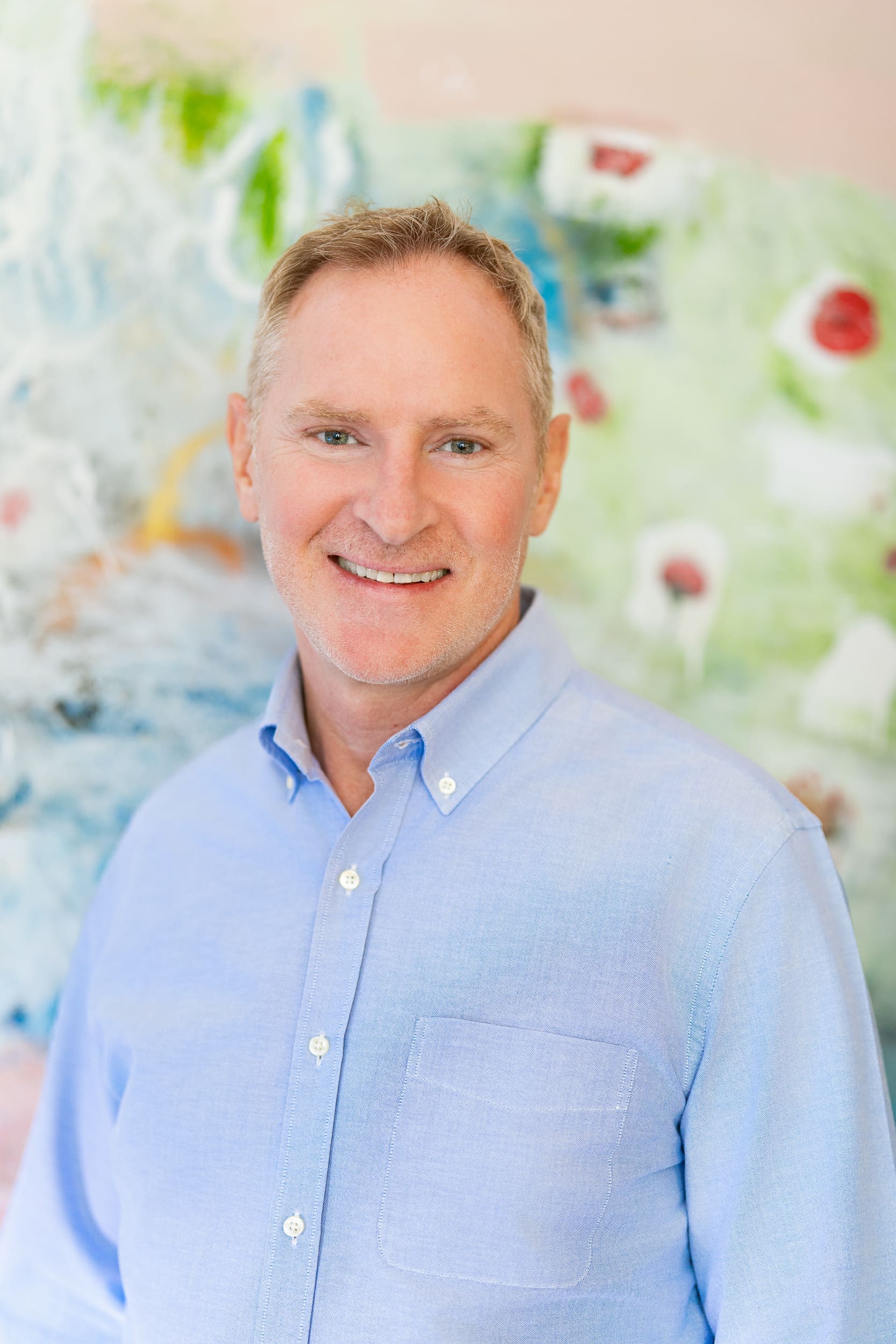 Blonde Man with a blue shirt his casual headshot taken by Sydney photographer Georgie Greene